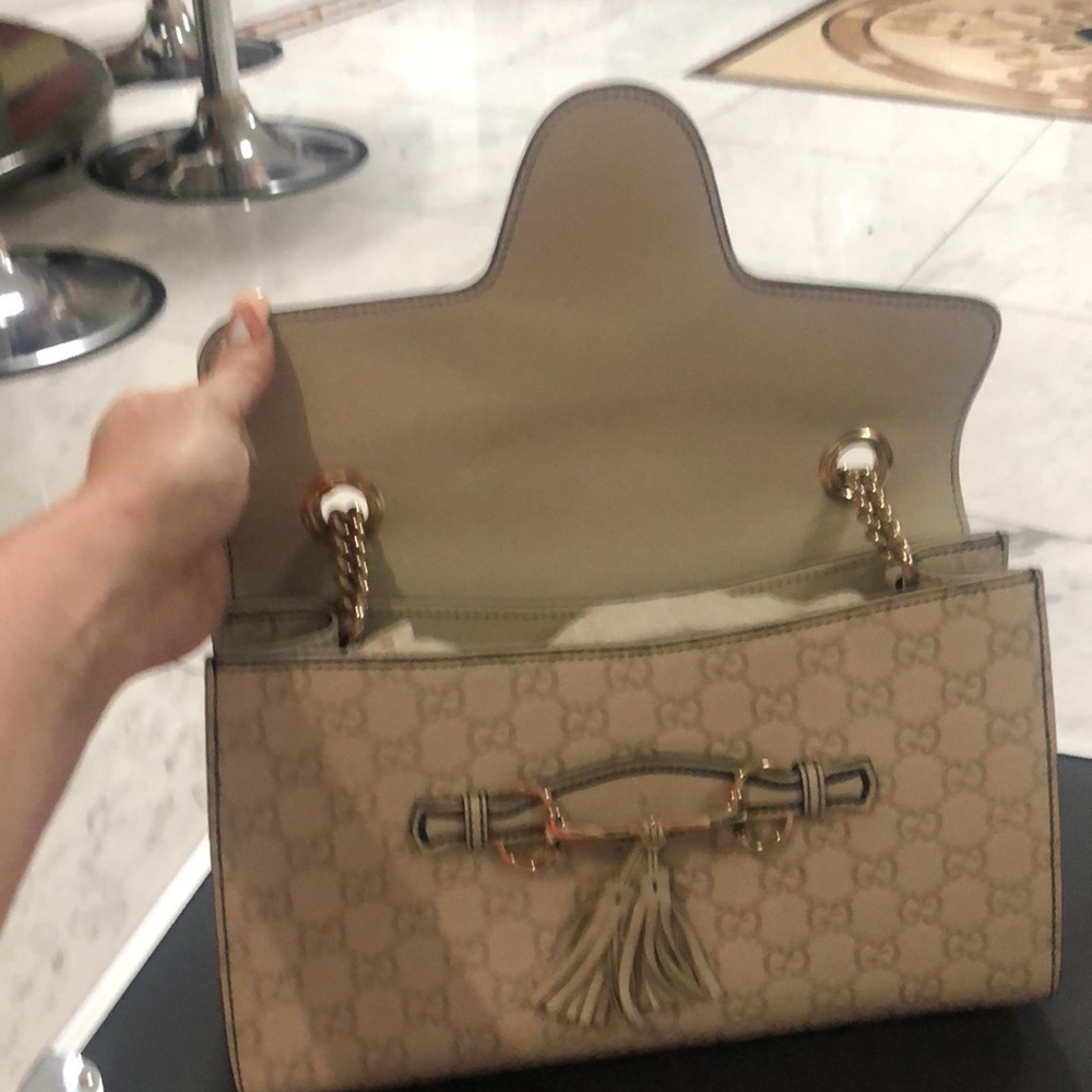 Ivory Gucci authentic bag. NWOT. This is the latest Gucci trending bag. - Picture 4 of 14